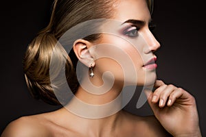 Glamour portrait of beautiful woman model with photo