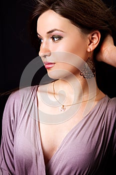 Glamour portrait of elegant woman with earrings