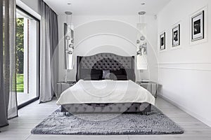 Glamour style bedroom in white and gray