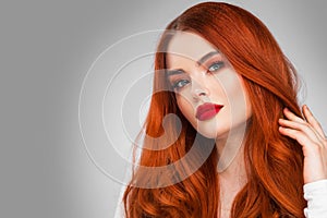 Glamour woman with long red hair