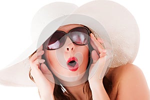 Glamour woman wearing summer straw hat photo