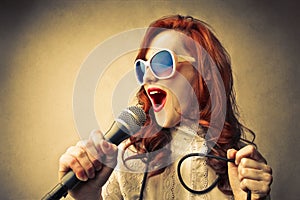 Glamour young woman singing