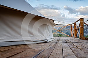 Glamping tent detail with mountain range panorama