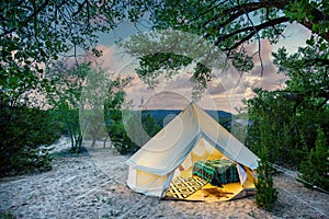 Glamping Tent Site in a Desert Sunset