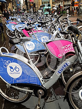 Hire bikes wet from the rain, Glasgow, UK