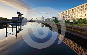 Glasgow panorama at dramatic sunrise with Clyde river, Scotland