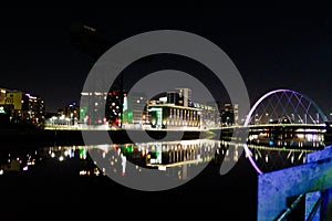 Finnieston Crane and The Clyde Arc illuminated at night. Banks of the River Clyde