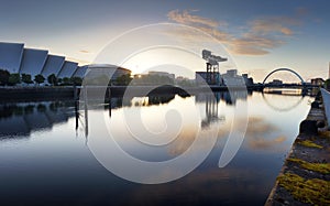 Glasgow skyline panorama at sunrise over river Clyde, Scotland
