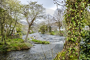 Glaslyn river running through Beddgelert in the heart of Smowdonia National Park in Gwynedd, Wales, UK