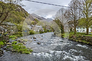 Glaslyn river running through Beddgelert in the heart of Smowdonia National Park in Gwynedd, Wales, UK