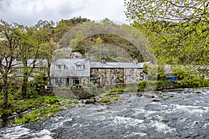 Glaslyn river running through Beddgelert in the heart of Smowdonia National Park in Gwynedd, Wales, UK