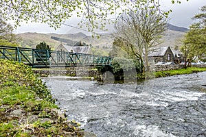 Glaslyn river running through Beddgelert in the heart of Smowdonia National Park in Gwynedd, Wales, UK