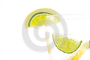 Glass of 7up with lemon and lime