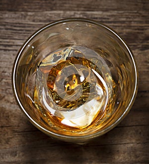 Glass of alcohol drink whiskey with ice