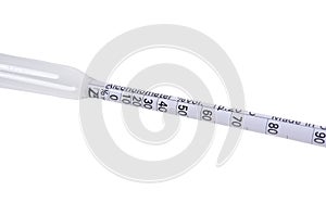 Glass alcoholometer for determining the amount of alcohol in a liquid on white background.with clipping path