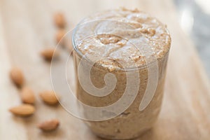 A glass of almond butter