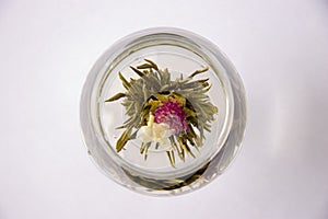 A glass of artisan blooming tea