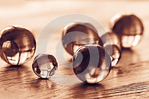 Glass balls of different sizes tinted in gold.