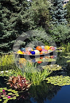 Glass Balls and Lilly Pads in Pond
