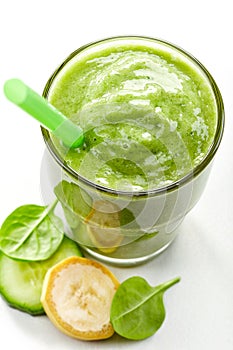 Glass of banana, cucumber and spinach smoothie