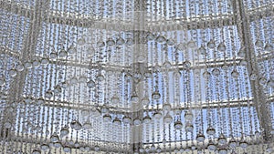 Glass bead garland with large drops of water. Interior design, transparent beads. Holiday decoration of the shopping center