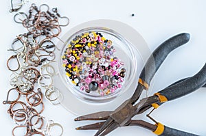 Glass beads, metal findings and tools for jewelry making. Hobby and handmade