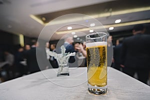 Glass of beer in business meeting