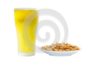 Glass of beer and candy isolated white background.