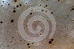 Glass of beer foam, top view, close up, macro