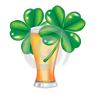 Glass of beer and four leaf clover