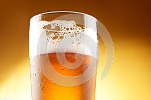 Glass of beer with froth