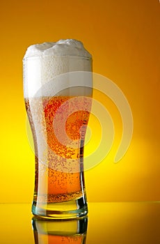 Glass of beer with froth