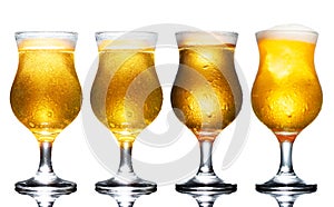 Glass of beer isolated on white background.