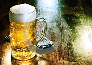 Glass beer mug with golden ale or draft