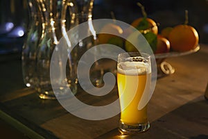 Glass of beer in natural sunlight