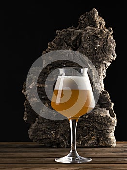 Glass of beer on a wood table