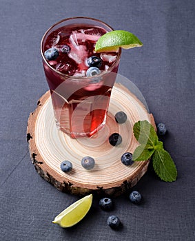 Glass berry water mint lime background blueberry coctail fresh drink ice