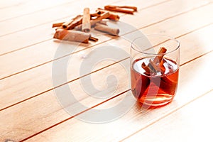 Glass of Black Tea with cinnamon sticks