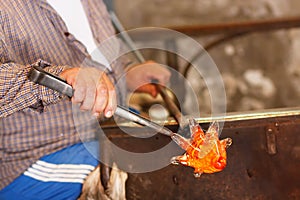 Glass Blower at His Work