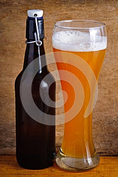 Glass and bottle of beer photo