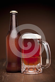 Glass and bottle of beer