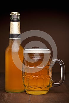 Glass and bottle of beer