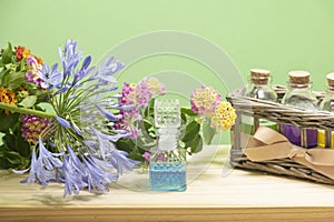 Glass bottle with blue essential oil