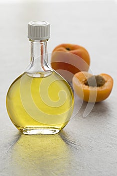 Glass bottle with cosmetic apricot kernel oil