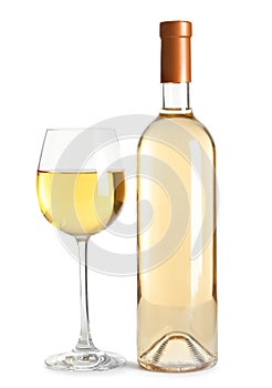 Glass and bottle of delicious wine on white