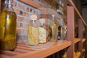 Glass bottle filled with flowers.