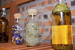 Glass bottle filled with flowers.
