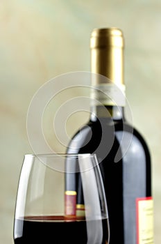 Glass and bottle of fine italian red wine