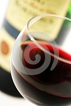 GLASS AND BOTTLE OF FRENCH RED