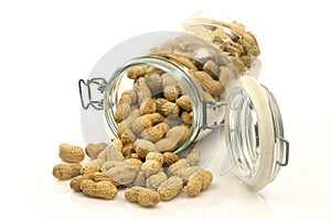 Glass bottle with lots of peanuts